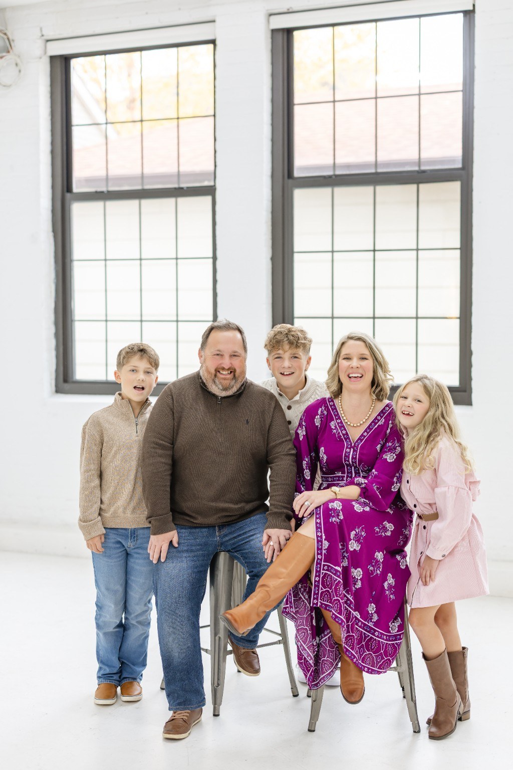 Katie with her family in a studio portrait